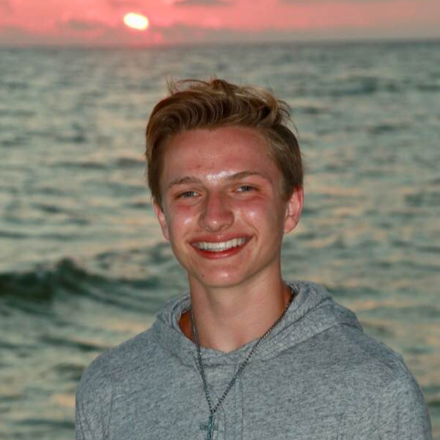 Reed Allen Schonberger smiling at sunset